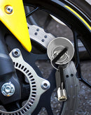 🔒 50% dto. Bloqueo de disco de freno de aleación de acero – resistente al corte y apalancamiento, impermeable y con 2 llaves. ¡Protege tu moto o bici del robo, 230 g! ✨🛡️