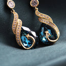 ✨ ¡50 % DE DESCUENTO POR TIEMPO LIMITADO! 🦚 Pendientes Phoenix: diseño de pavo real, piedras de circonita, ligeros, ideales para regalar 🎁