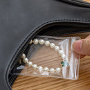 Juego de libros de almacenamiento de joyas transparentes